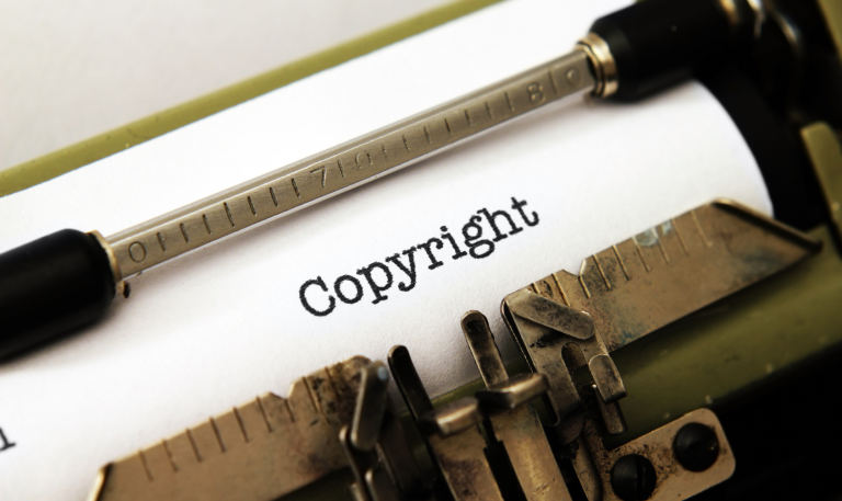 Typewriter with 'copyright' written on the paper